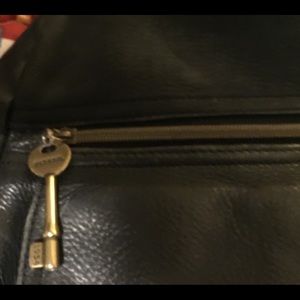 Fossil backpack Black, very roomy. Lots of pockets